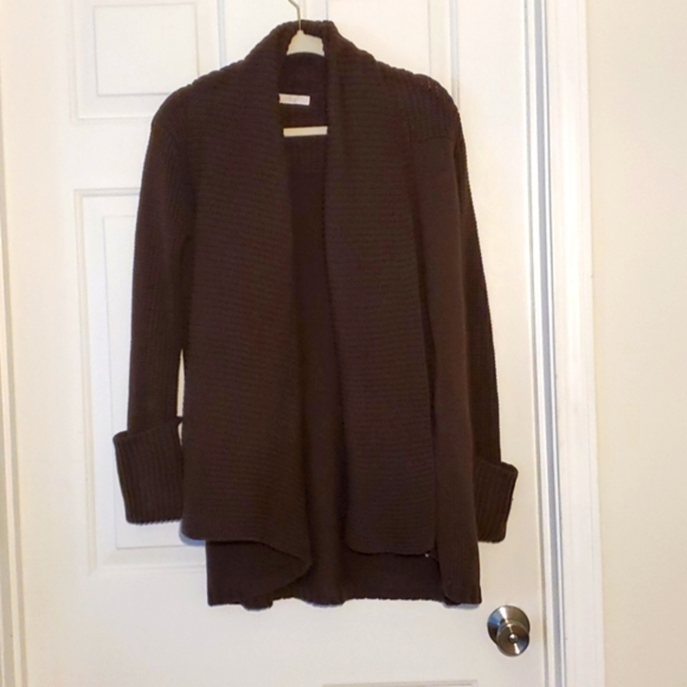 32"long, Pockets and Perfect condition.